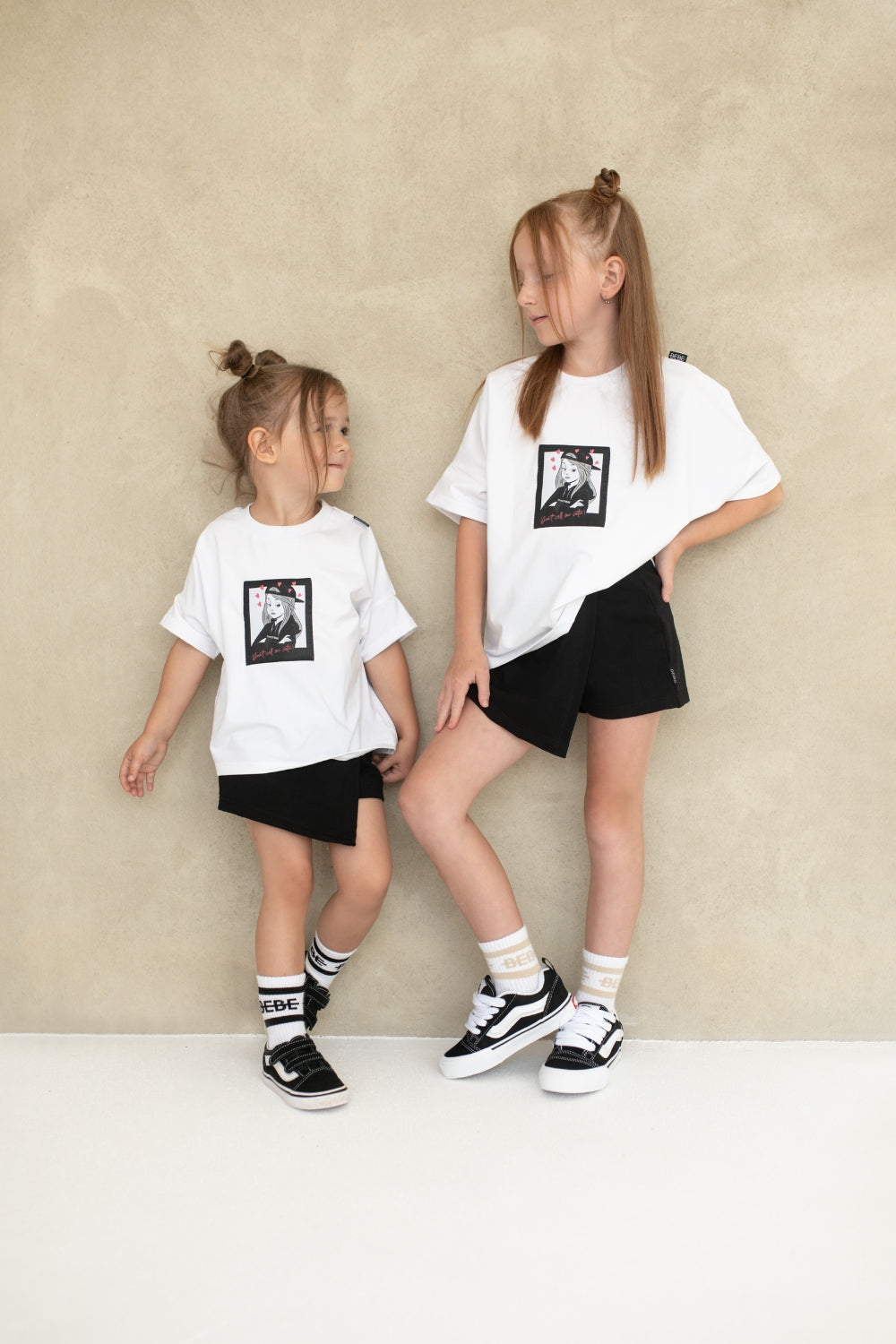 OVERSIZOWA KOSZULKA Z NASZYWKĄ DON′T CALL ME CUTIE