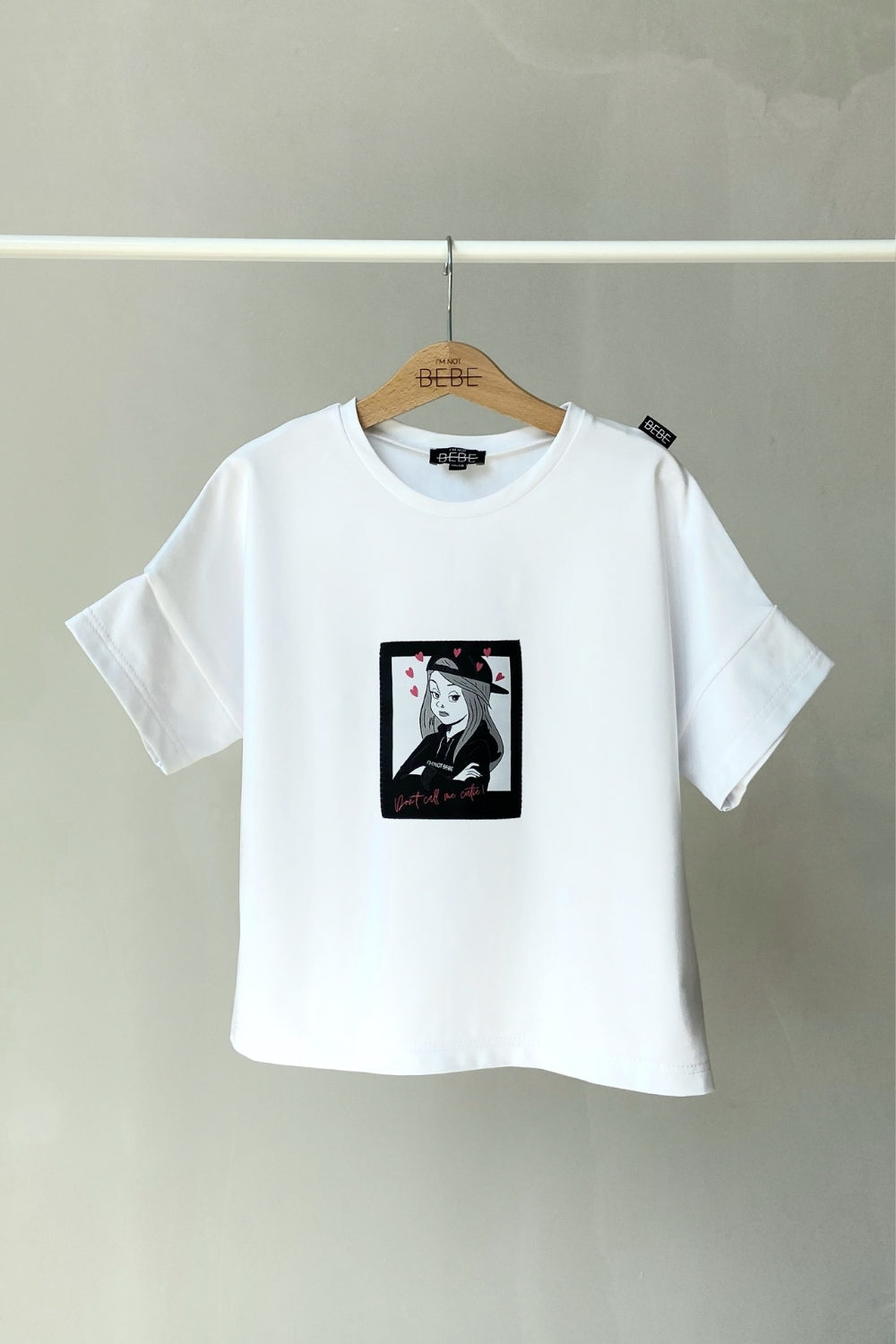 OVERSIZOWA KOSZULKA Z NASZYWKĄ DON′T CALL ME CUTIE