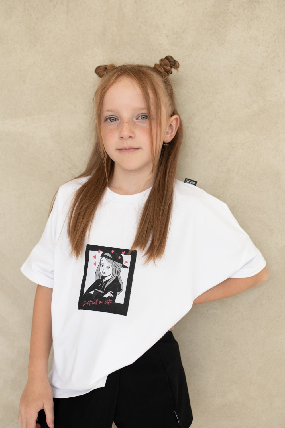 OVERSIZOWA KOSZULKA Z NASZYWKĄ DON′T CALL ME CUTIE