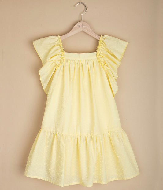 Żółta sukienka z kokardą z tyłu