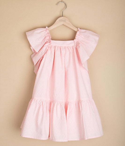 Różowa sukienka z kokardą z tyłu